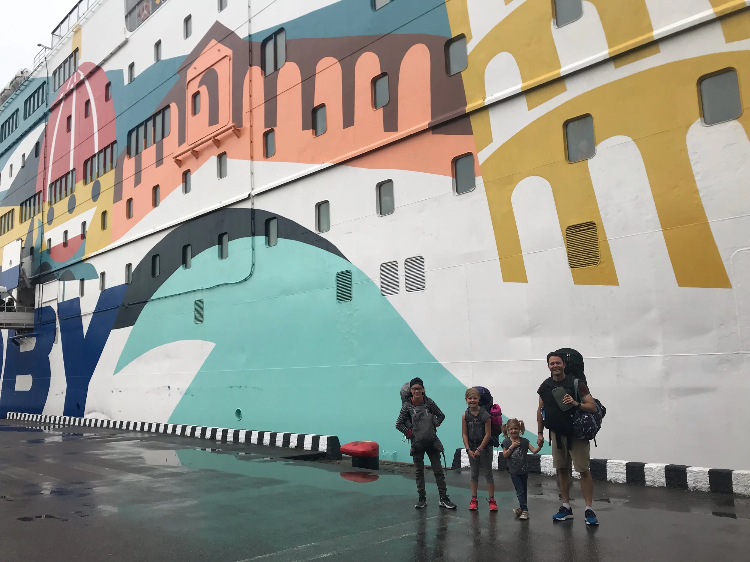 Getting off the boat with our backpacks