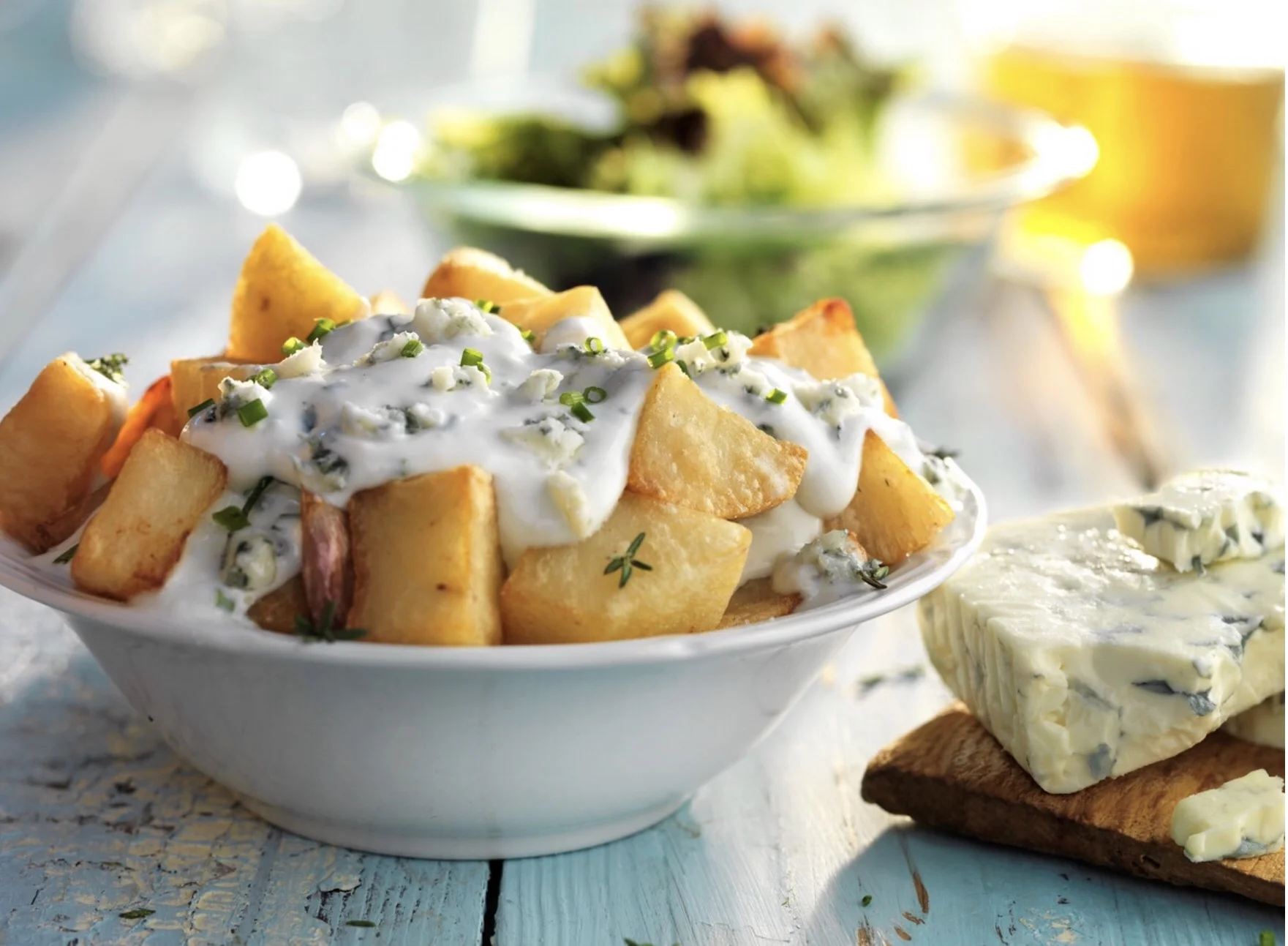 This is a picture of potatoes and melted Gorgonzola.