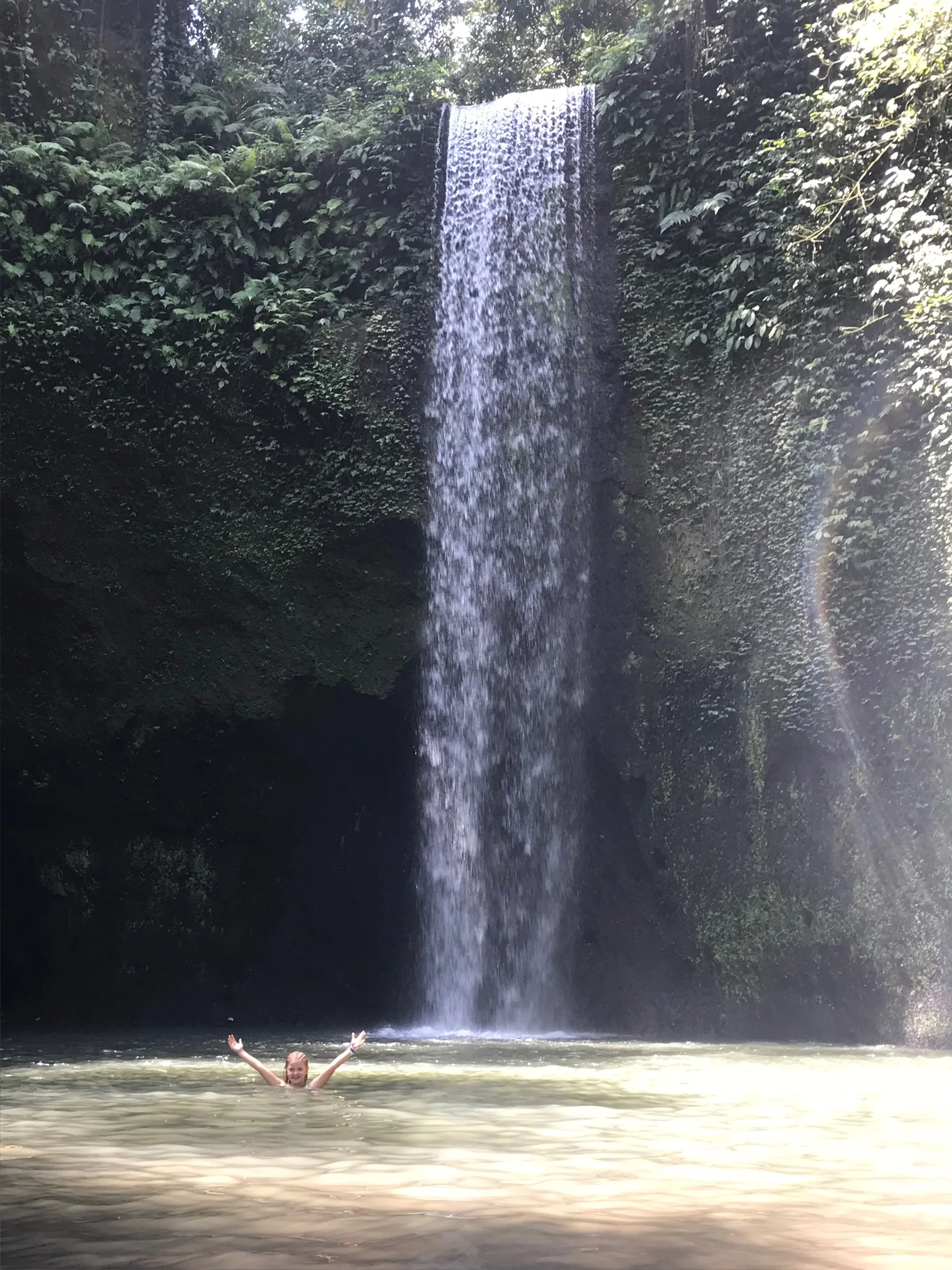 This is Josie swimming around at the bottom of the Tibumana Waterfall