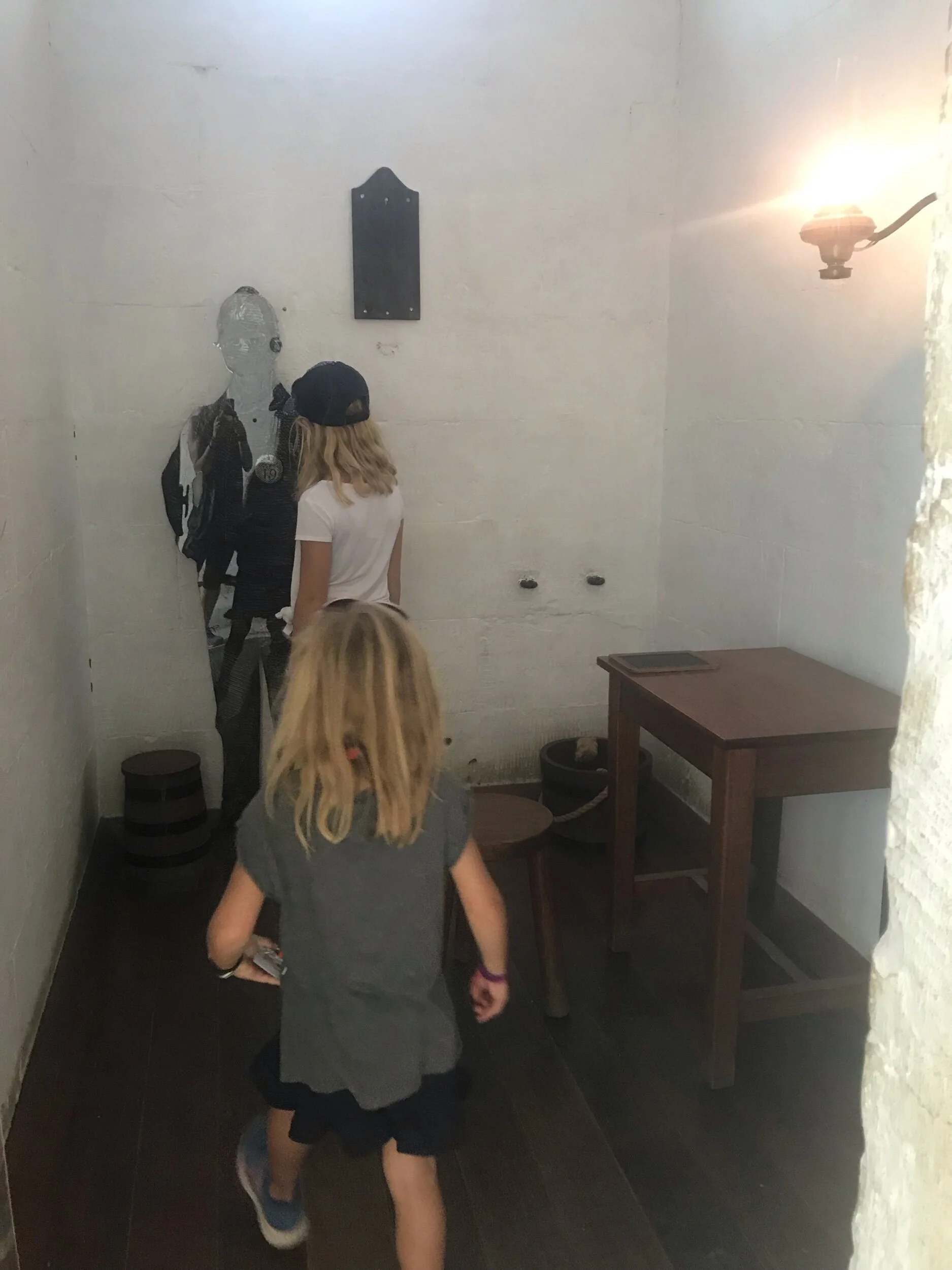 This is me and my sister in one of the cells.