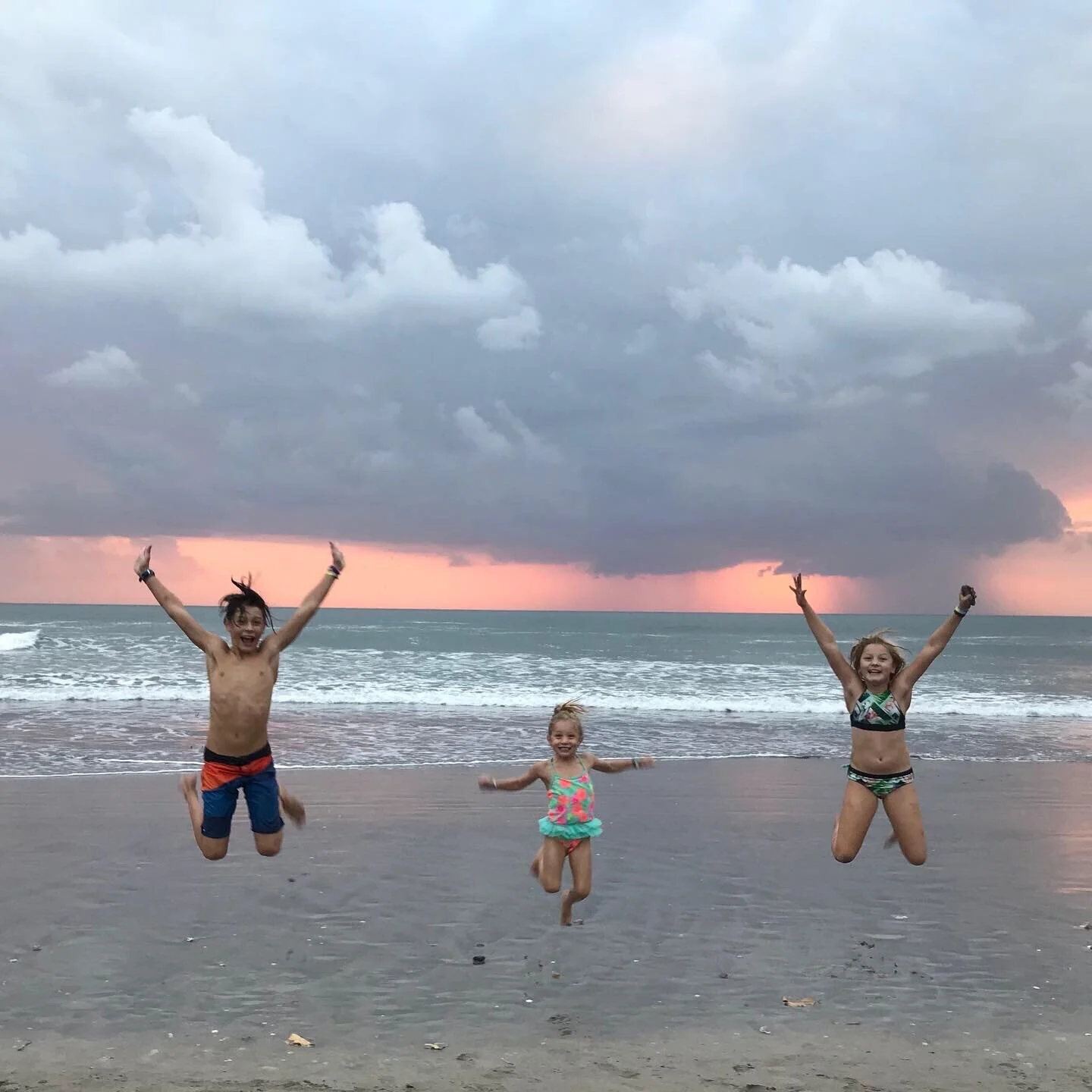 Us jumping on the beach in Bali!! With the sunset!!