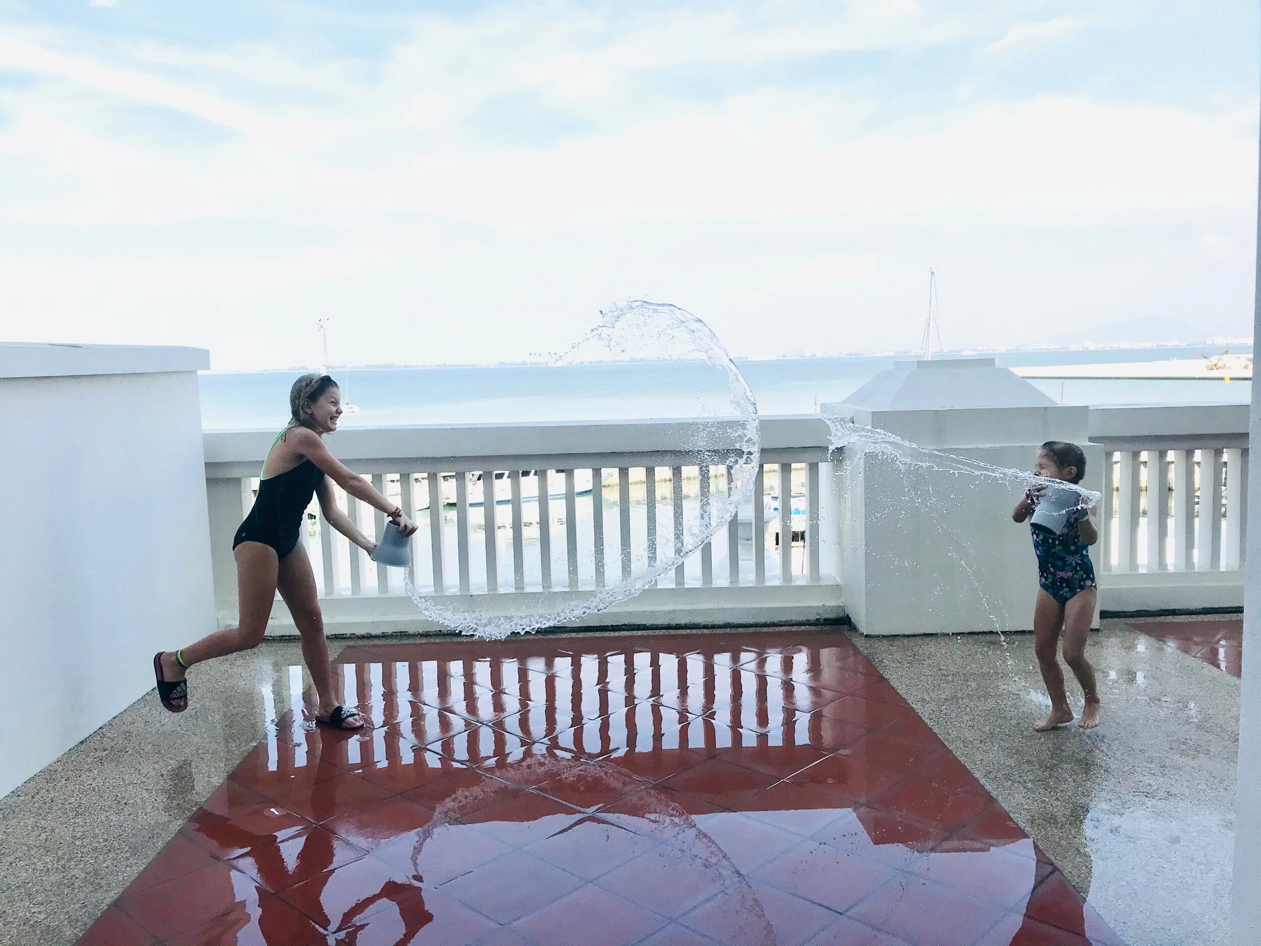 Playing on the big balcony!