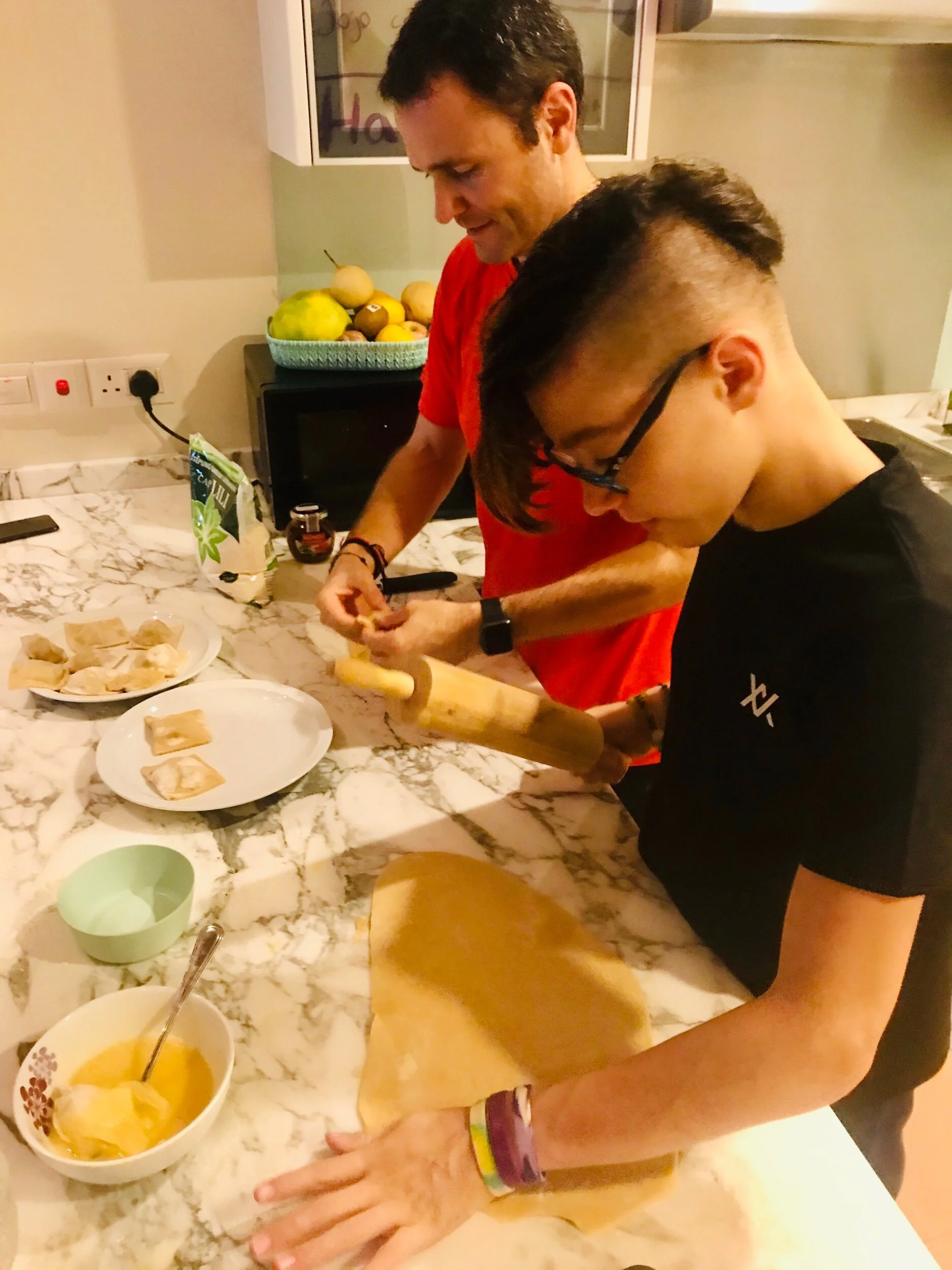 Making ravioli with egg dough