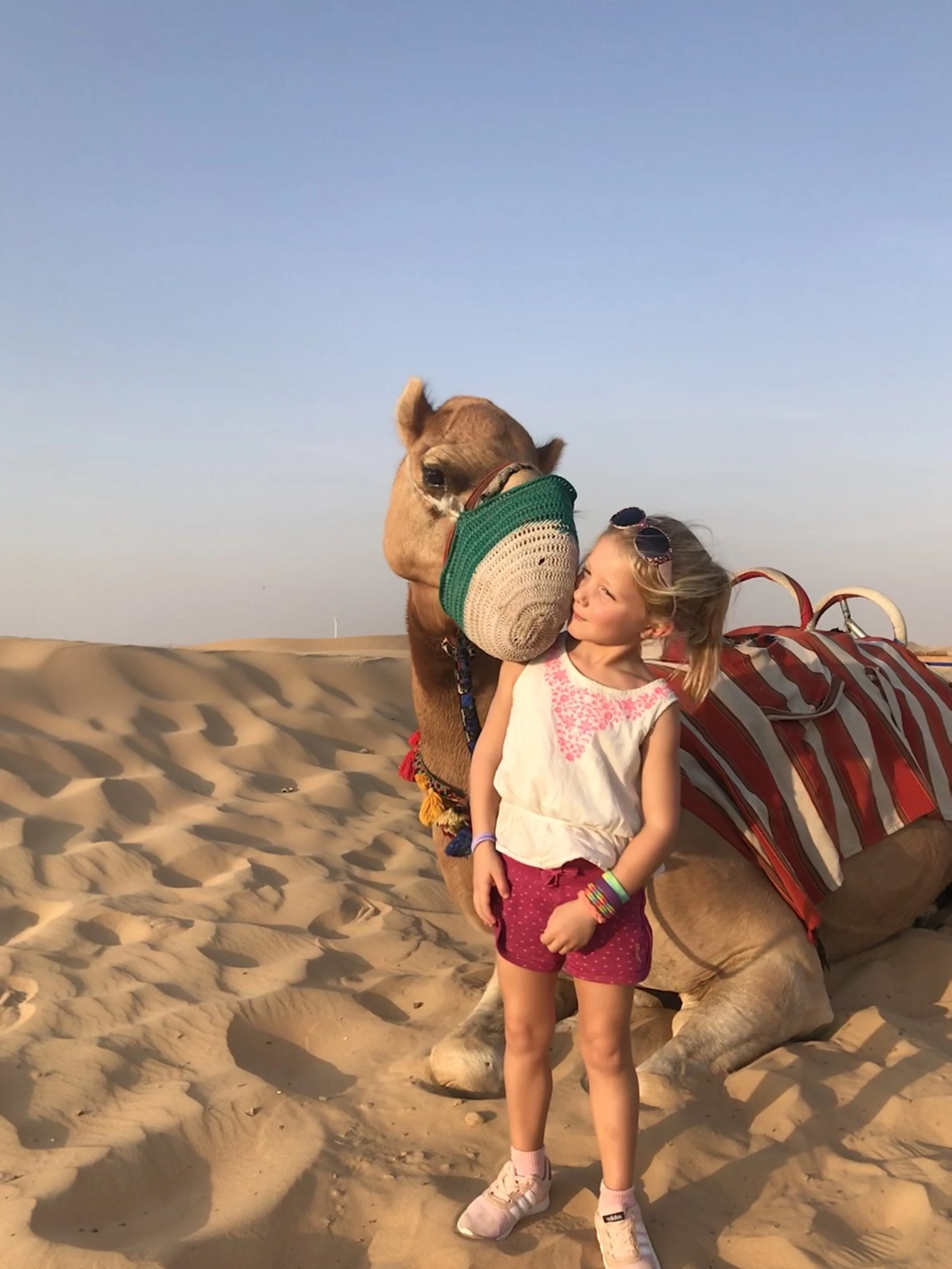 So much smooching! Madeline smooching the camel :)