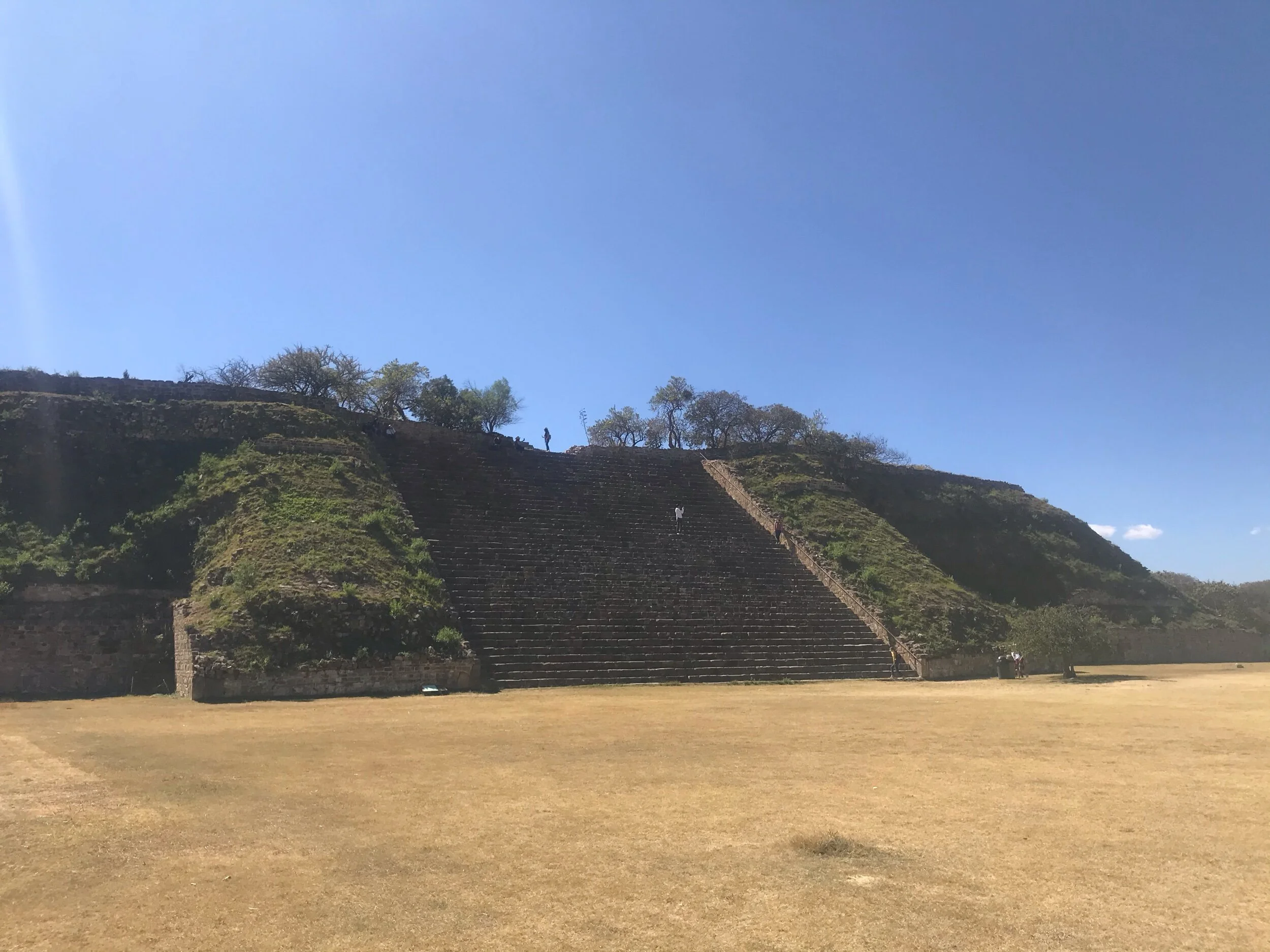 The largest temple at Monte Albán (for scale you can see the person on top)